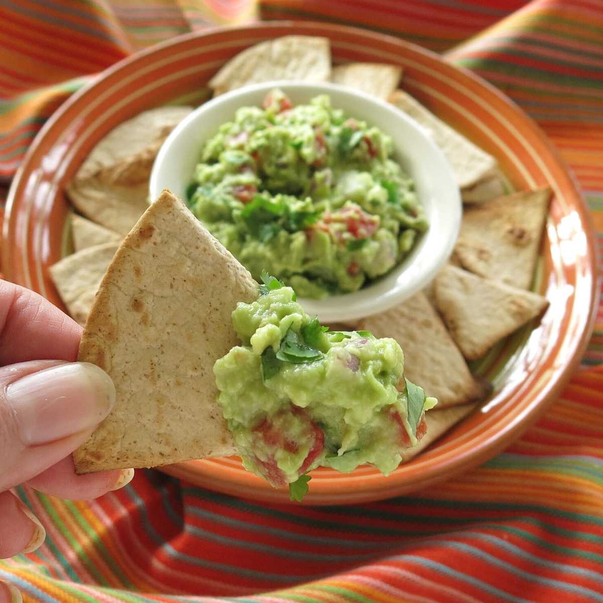 Guacamole on a homemade low-carb tortilla chip.