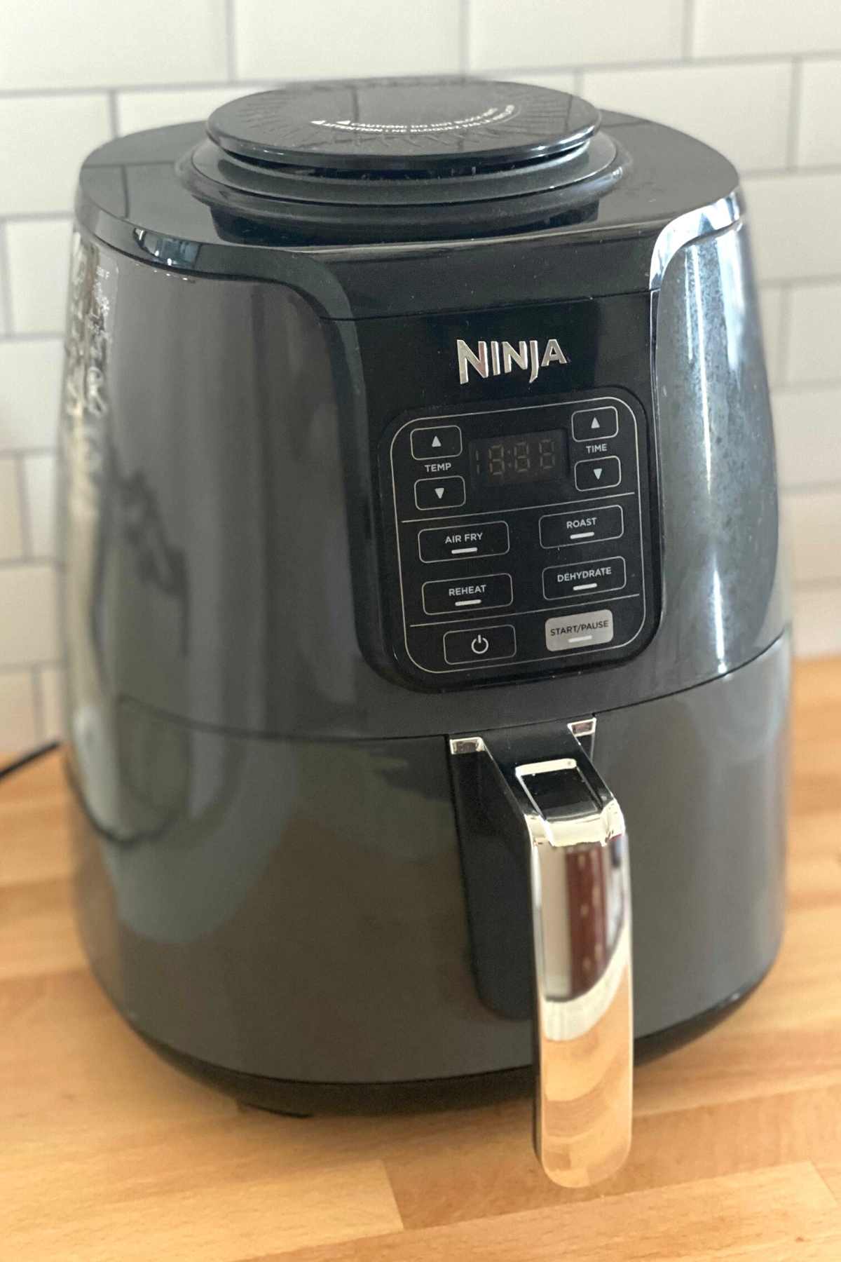 4 quart Ninja air fryer on counter.