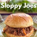 Gourmet sloppy joe on bun with lettuce in background and title on top.