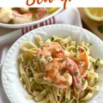 Argentine shrimp scampi over pasta with title of recipe..