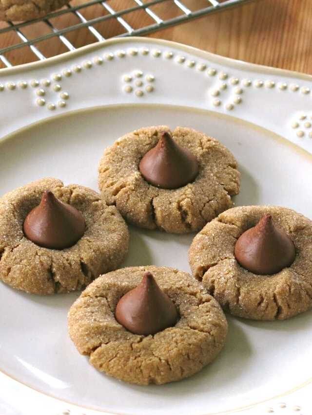 4 ingredient peanut butter blossoms cookies on a plate.