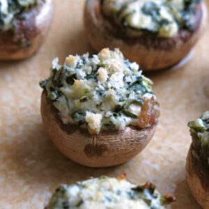 Easy stuffed mushrooms with cream cheese on a serving platter.