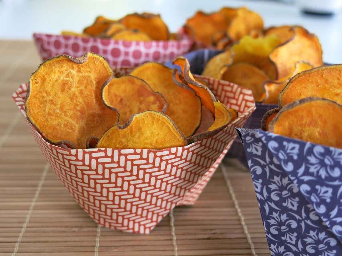 Sweet potato chips in a paper bowl.