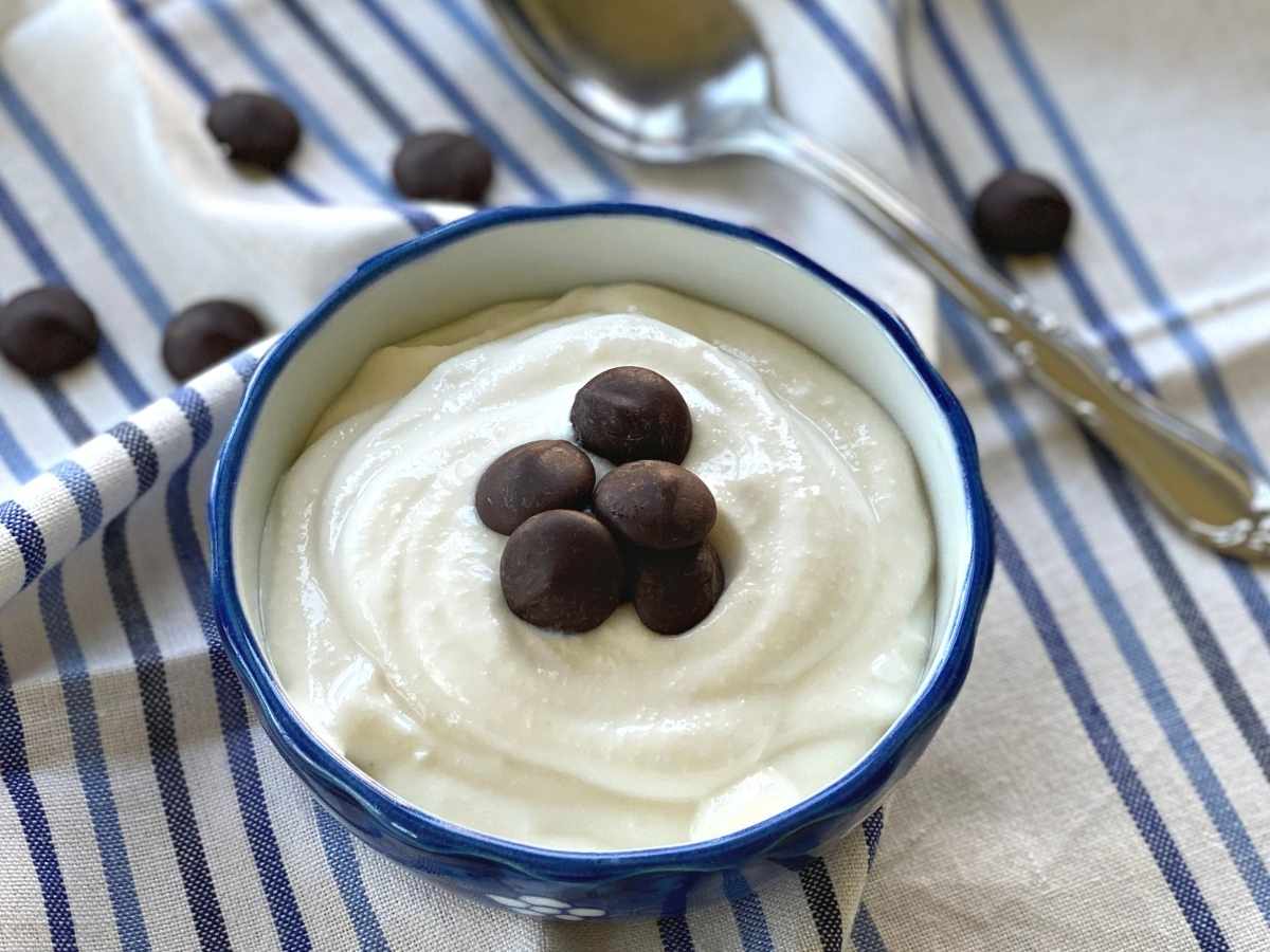 Whipped cottage cheese dessert in a bowl topped with chocolate chips.