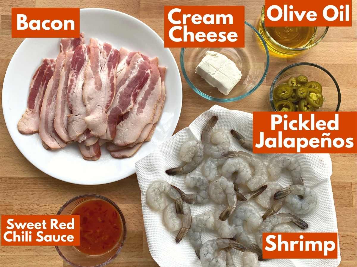 Labeled ingredients to make bacon wrapped shrimp stuffed with cream cheese and jalapenos.