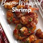 Platter of bacon-wrapped shrimp with text overlay.