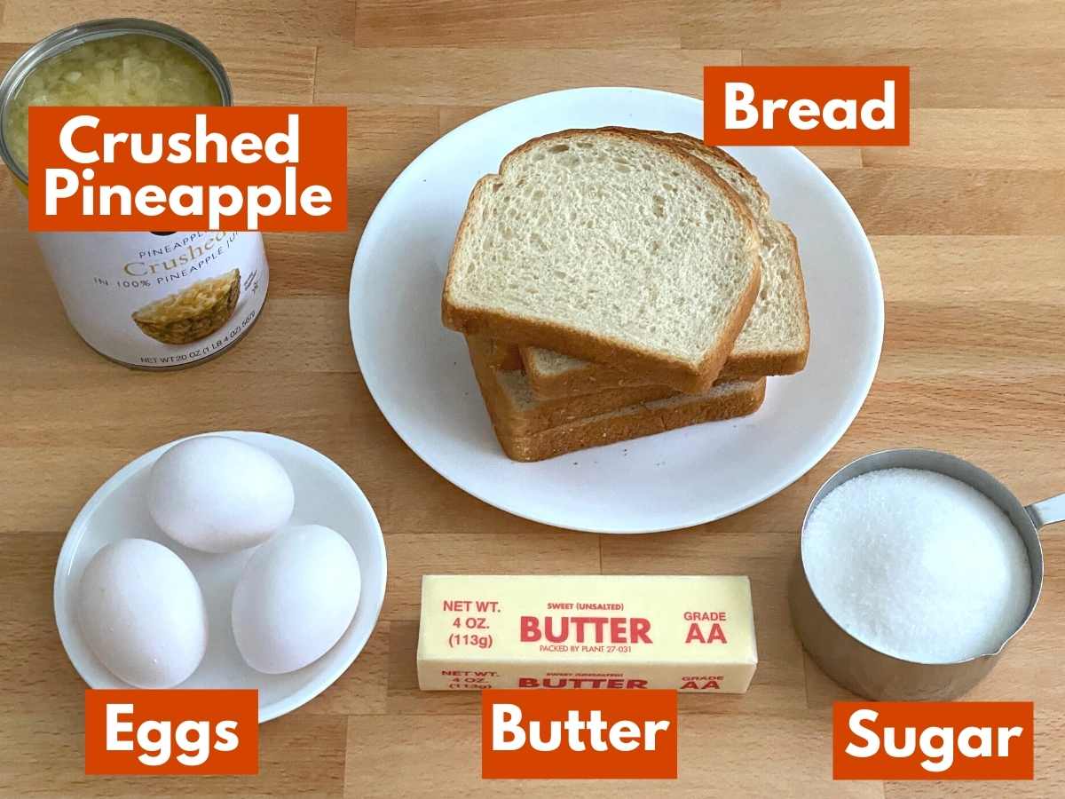 Ingredients to make pineapple souffle recipe: Crushed pineapple, bread, eggs, butter, and sugar.