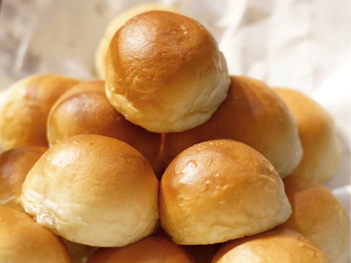 Soft rolls stacked on top of each other.