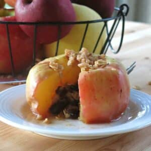 Easy microwave baked apple on a plate.