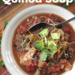 Slow Cooker Chicken Quinoa Soup in a bowl with recipe name printed on top.