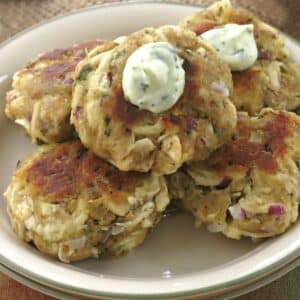 Plate of easy leftover chicken cakes made with shredded rotisserie chicken on a plate.