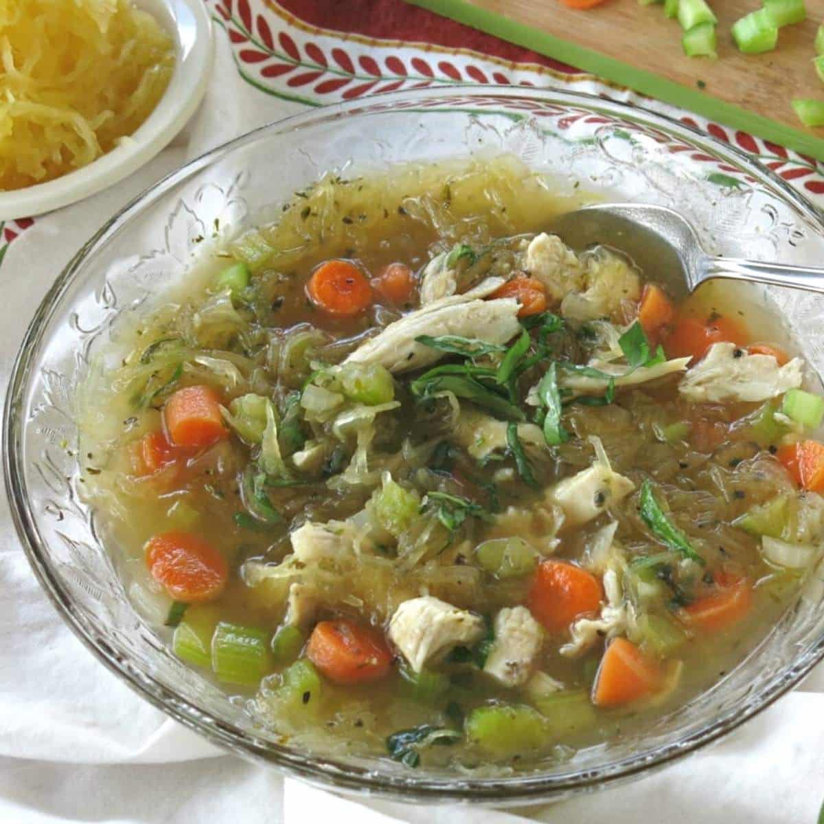 Spaghetti squash soup with chicken in a bowl.