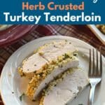 Three slices of herb crusted turkey tenderloin on a plate.