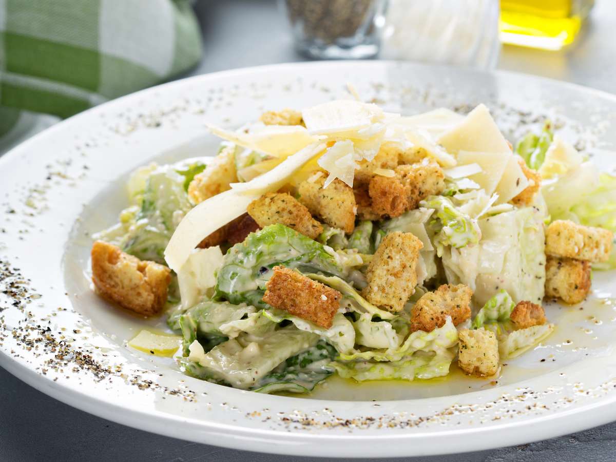 Ceasar salad on a plate.