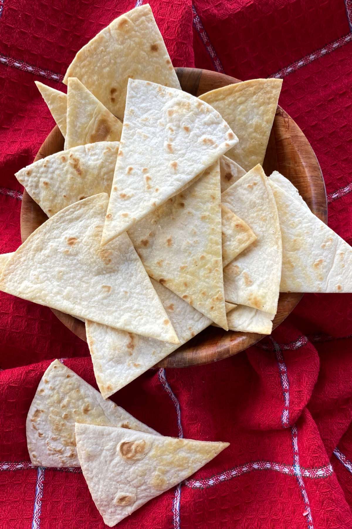 Basket with keto tortilla chips spilling out.