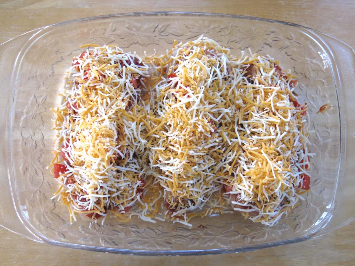 Uncooked Monterey Chicken in a glass baking dish.