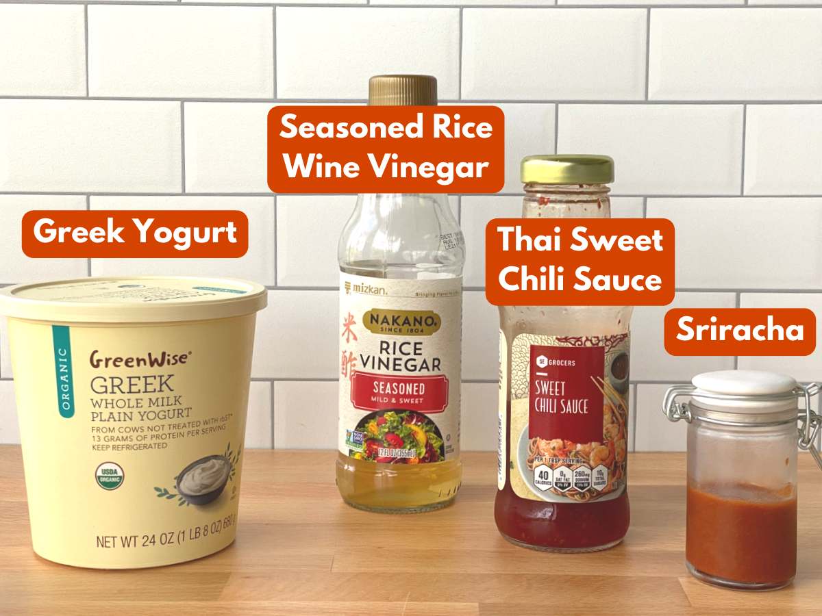 Ingredients to make healthy bang bang sauce: Greek yogurt, Thai sweet chili sauce, seasoned rice vinegar, and sriracha.