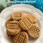 3-ingredient almond butter cookies on a plate with title of recipe on top.