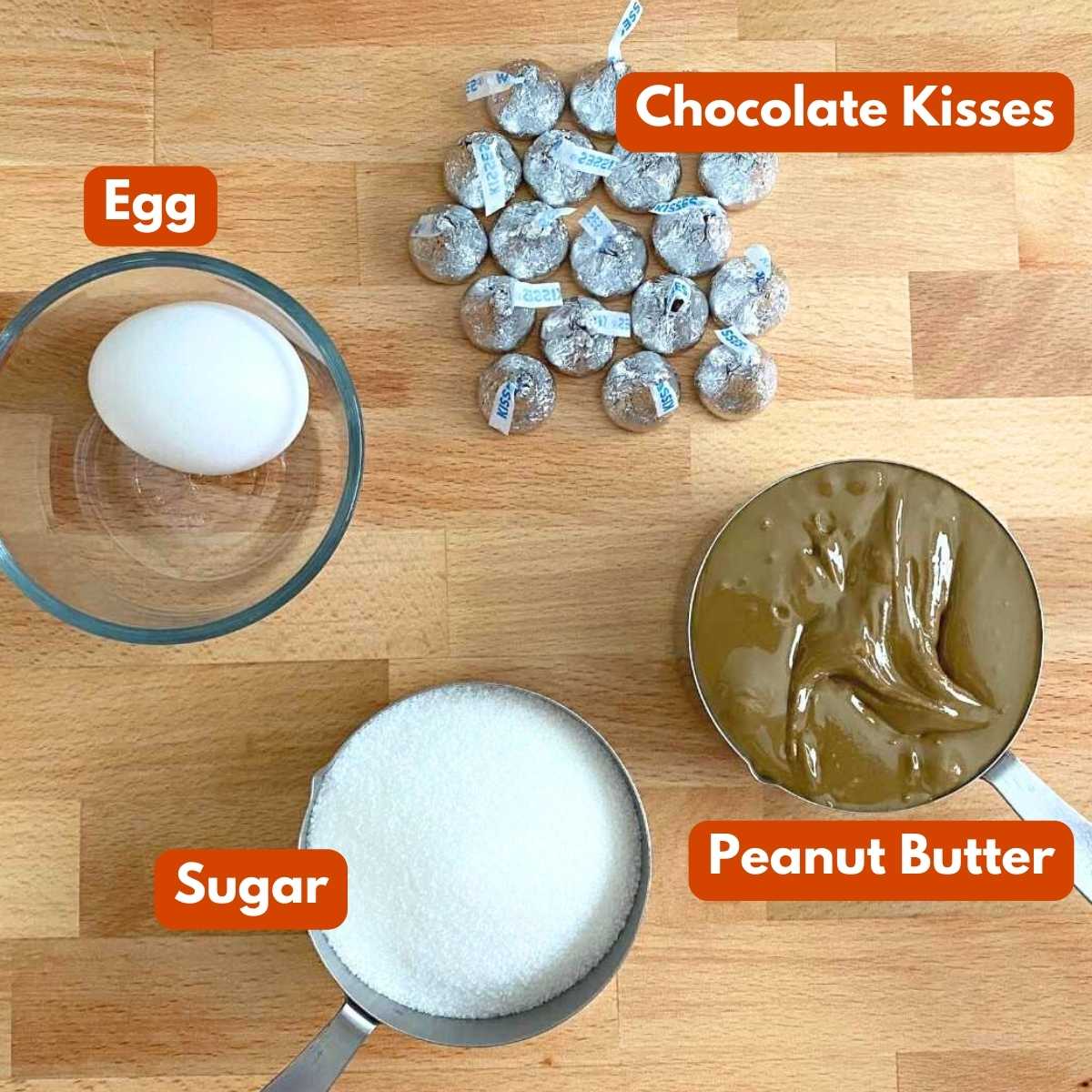 Ingredient to make easy peanut butter blossom cookies: Peanut butter, sugar, egg, and chocolate kisses.