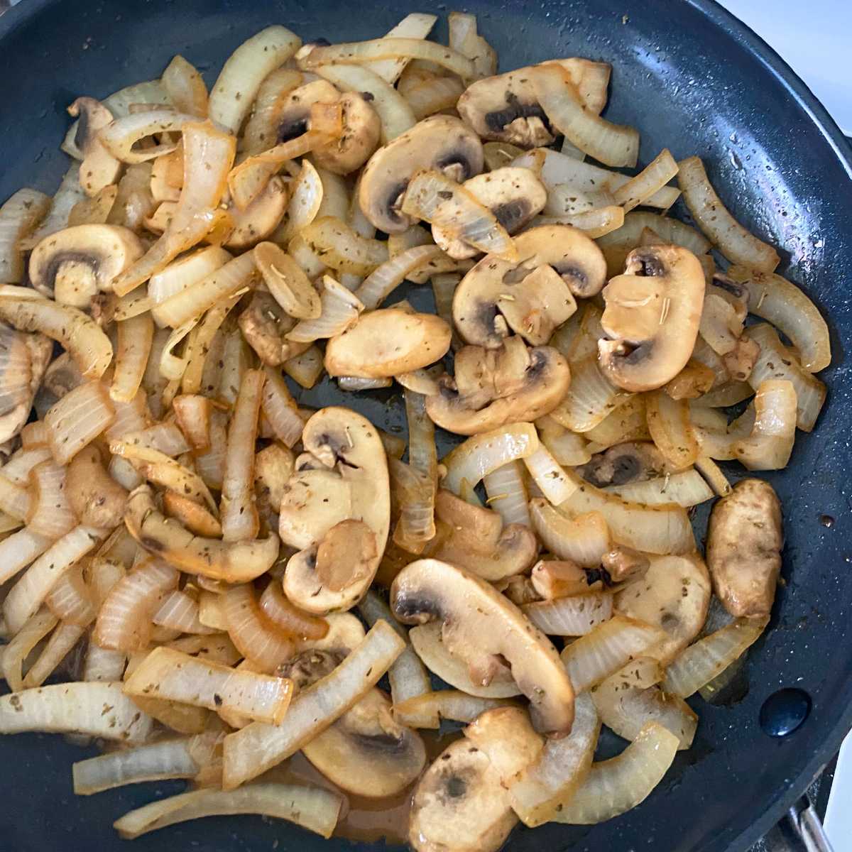 Softened onions and mushrooms in a large skillet.