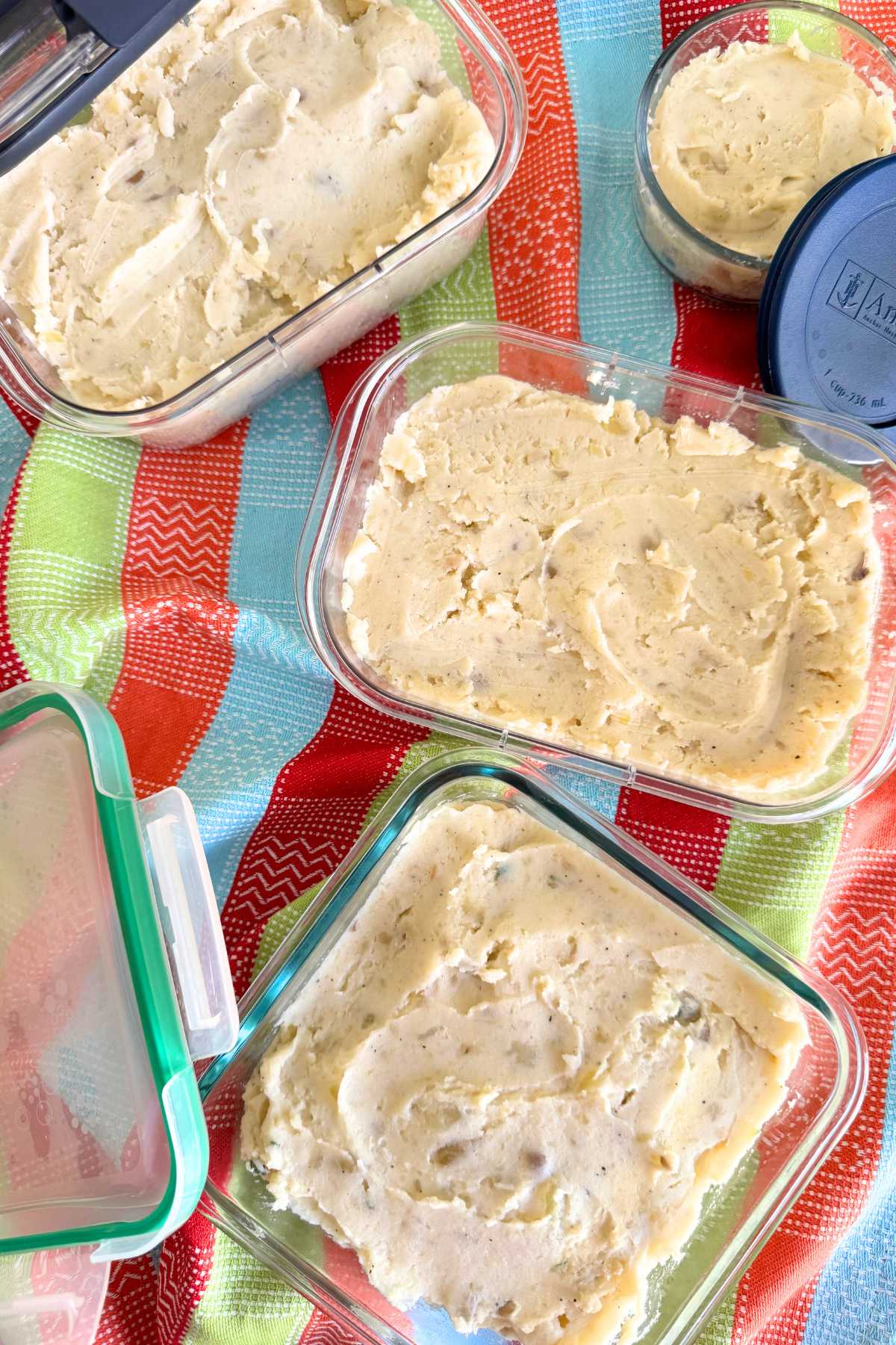 Make ahead mashed potatoes in small, medium, and large storage containers with the lids leaning against them. 