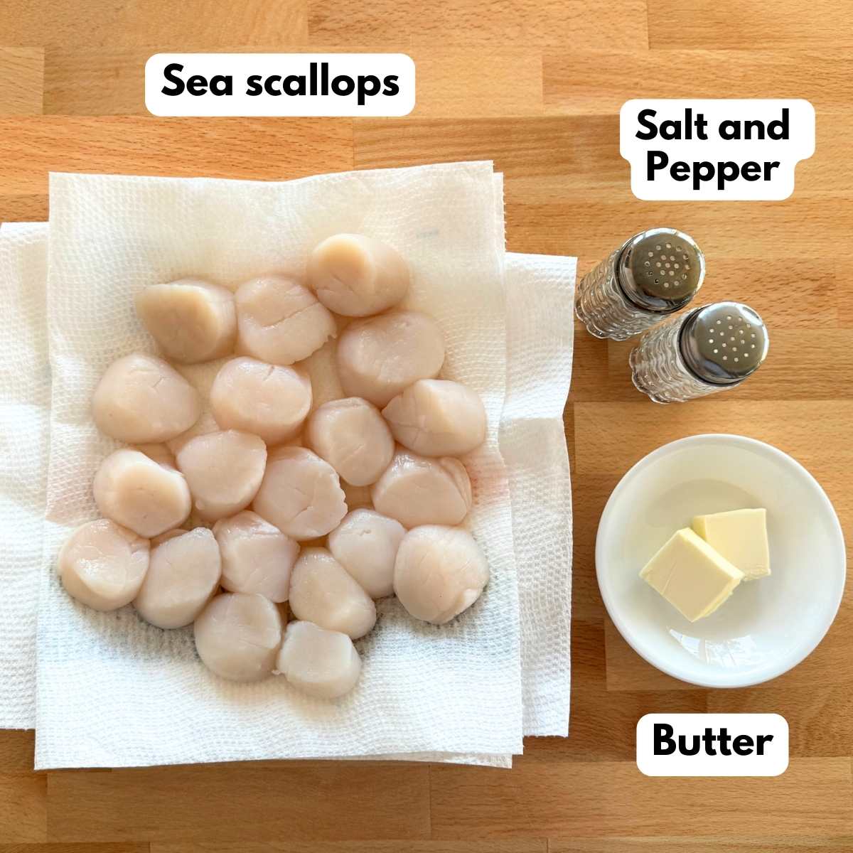 Ingredients for seared scallops: sea scallops, butter, salt and pepper.