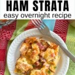 Serving of ham strata on a white plate with a fork with a casserole dish with more behind it and a text overlay that says: Ham Strata, easy, overnight recipe.