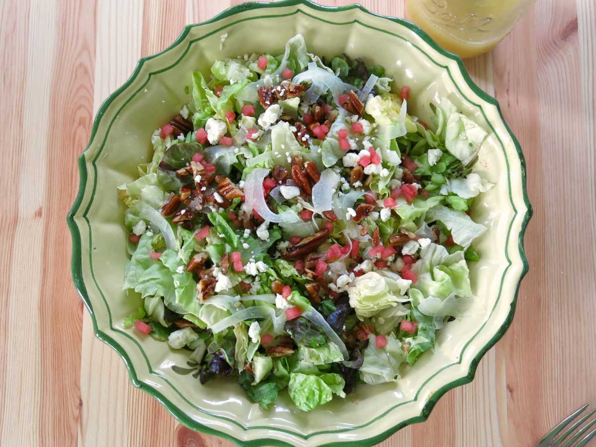 Summer salad with watermelon and fennel in a large bowl. 