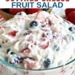Cottage Cheese Fruit Salad with strawberries, blueberries, and blackberries in a glass bowl with text overlay with the name of the recipe.