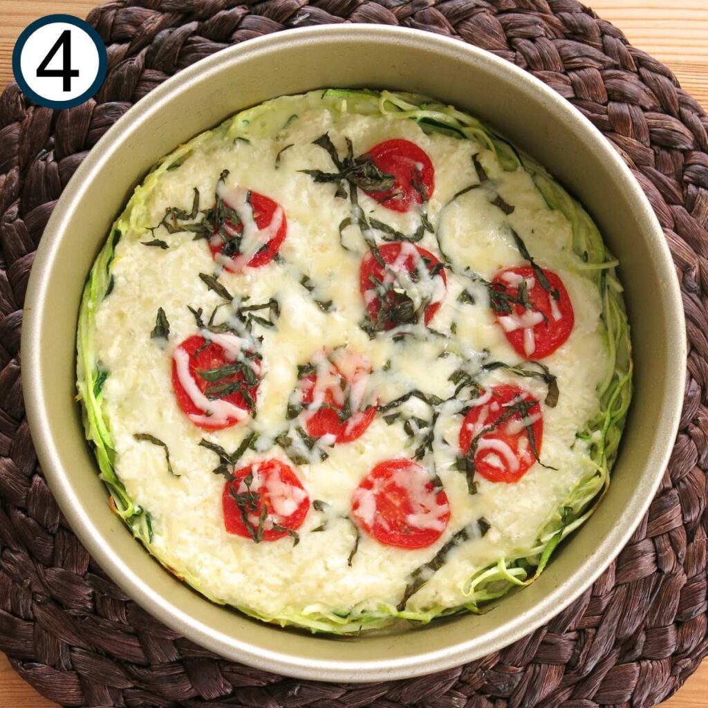 Cooked crustless zucchini pie in a circular pan.