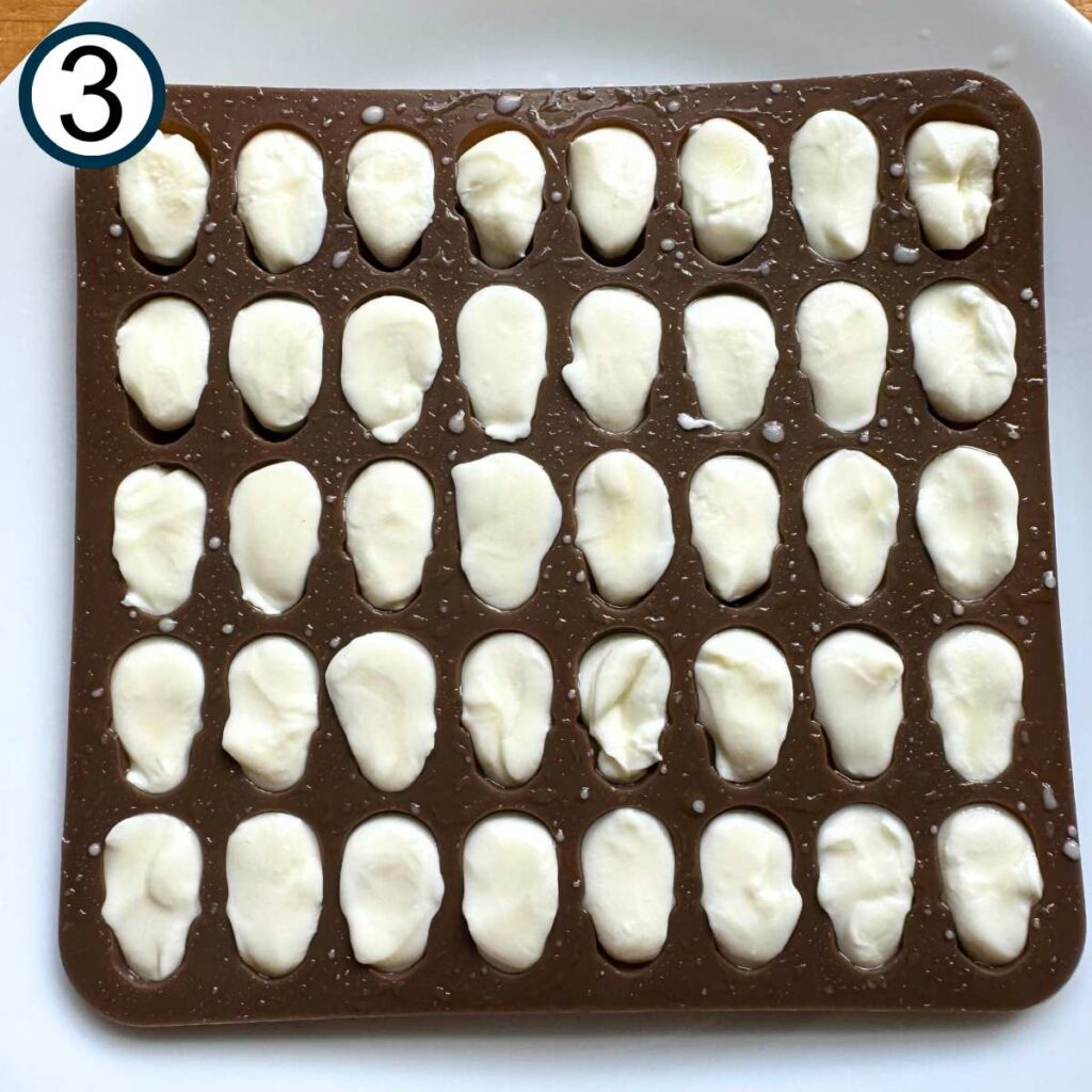 Mozzarella pressed into a skull candy mold.