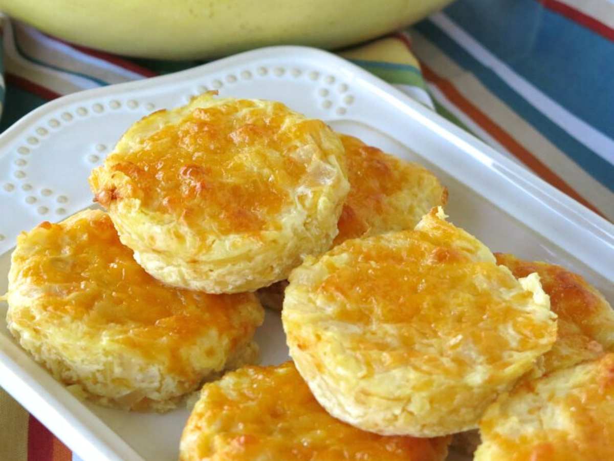 Spaghetti squash au gratin cups stacked on a serving platter.