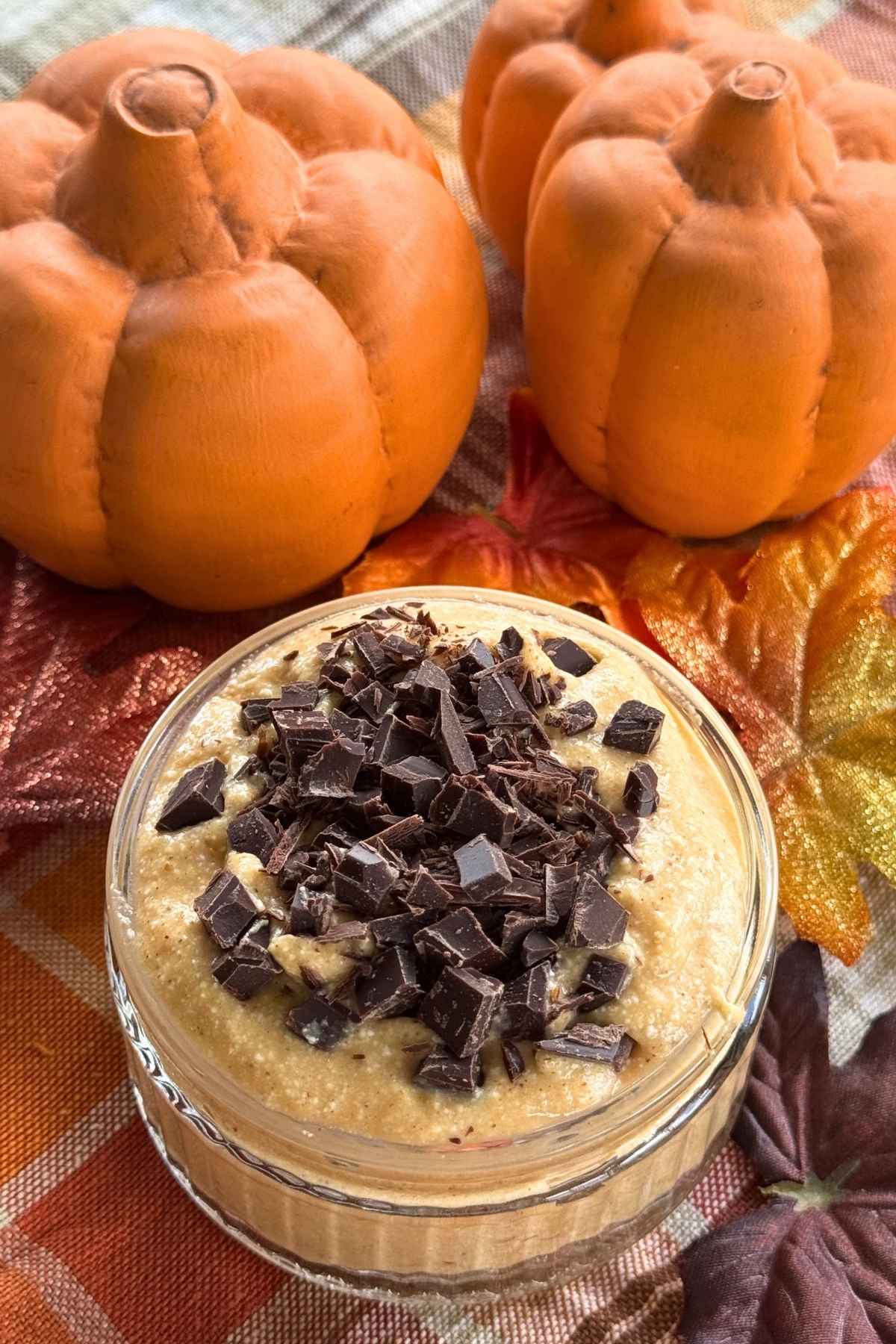 Whipped pumpkin cottage cheese pudding topped with chopped dark chocolate.